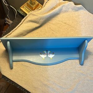 Vintage Blue Wooden Shelf with Goose Design